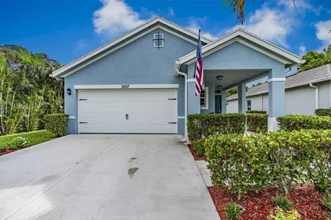 Exterior - 5557 SE Isabelita Ave, Stuart, FL 34997 photo 2 of 6