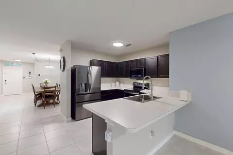 Kitchen - 5557 SE Isabelita Ave, Stuart, FL 34997 photo 7 of 7