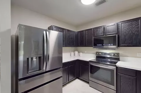 Kitchen - 5557 SE Isabelita Ave, Stuart, FL 34997 photo 2 of 7