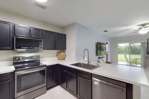 Kitchen - 5557 SE Isabelita Ave, Stuart, FL 34997 photo 1 of 7