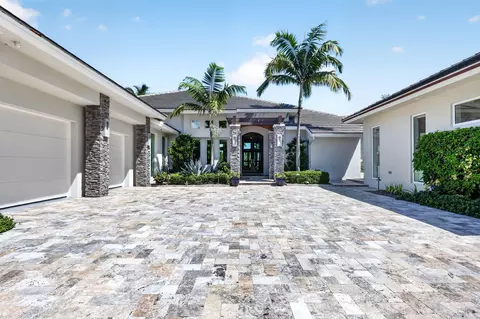 Exterior - 7037 SE Harbor Cir, Stuart, FL 34996 photo 3 of 12