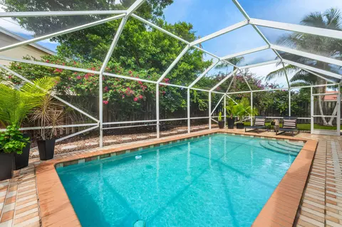 Exterior - 317 Daly Rd, Tequesta, FL 33469 photo 6 of 12