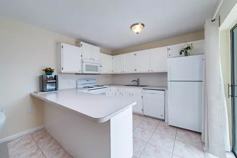 Kitchen - 5793 SE Windsong Ln, Stuart, FL 34997 photo 1 of 4