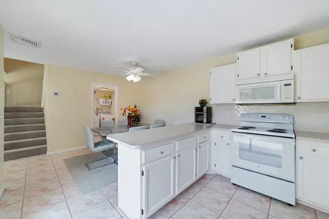 Kitchen - 5793 SE Windsong Ln, Stuart, FL 34997 photo 3 of 4