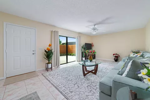 Living - 5793 SE Windsong Ln, Stuart, FL 34997 photo 2 of 3