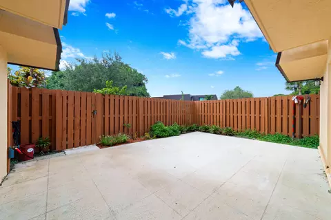 Exterior - 5793 SE Windsong Ln, Stuart, FL 34997 photo 3 of 5