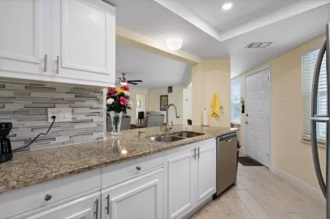 Kitchen - 3290 SE Aster Ln #D158, Stuart, FL 34994 photo 4 of 4