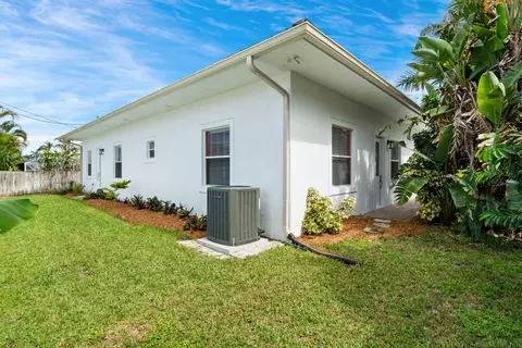 Exterior - 5637 SE Major Way, Stuart, FL 34997 photo 9 of 12
