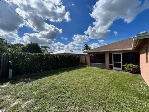 Exterior - 5795 SE Mitzi Ln, Stuart, FL 34997 photo 5 of 6