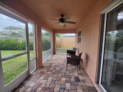 Exterior - 5795 SE Mitzi Ln, Stuart, FL 34997 photo 4 of 6