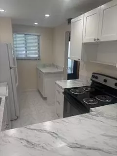 Kitchen - 5403 SE Miles Grant Rd #H108, Stuart, FL 34997 photo 2 of 2