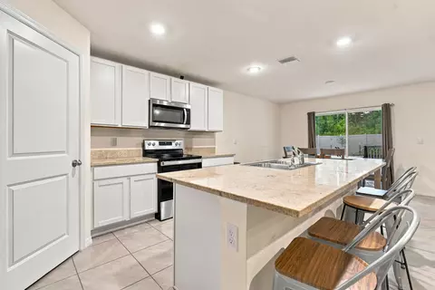 Kitchen - 6765 SE 3rd Loop, Ocala, FL 34472 photo 2 of 5