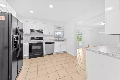 Kitchen - 6575 NW 3rd St, Margate, FL 33063 photo 1 of 2