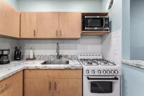 Kitchen - 301 E Mcnab Rd #113, Pompano Beach, FL 33060 photo 3 of 3