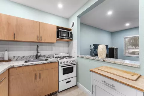 Kitchen - 301 E Mcnab Rd #113, Pompano Beach, FL 33060 photo 1 of 3