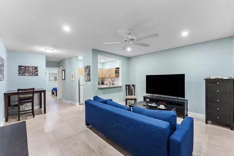 Living - 301 E Mcnab Rd #113, Pompano Beach, FL 33060 photo 2 of 4