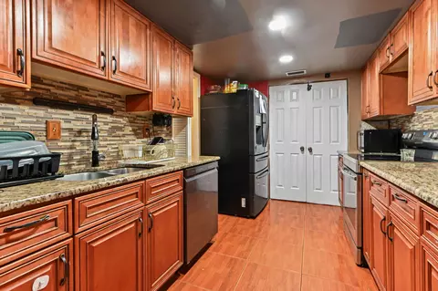 Kitchen - 941 W 80th Pl, Hialeah, FL 33014 photo 1 of 3