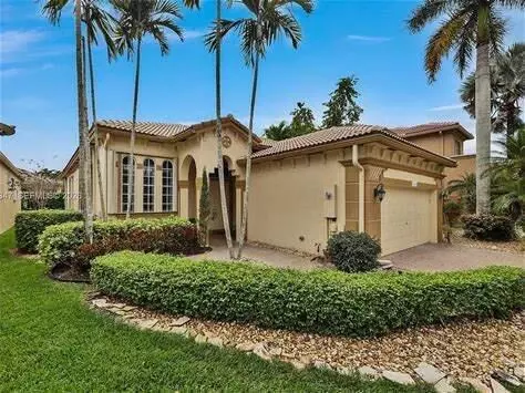 12438 NW 57th Ct, Coral Springs, FL 33076