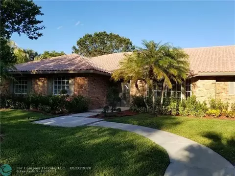 7010 E Cypresshead Dr, Parkland, FL 33067 photo 1