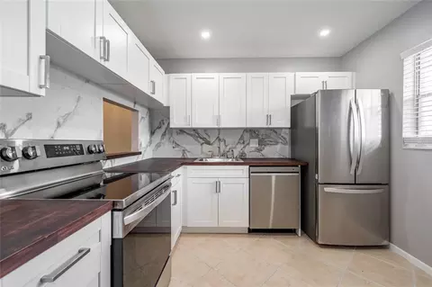 3040 Holiday Springs Blvd #302, Margate, FL 33063