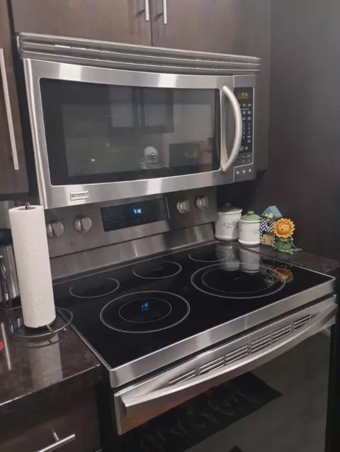 Kitchen - 1250 E Sample Rd #307, Pompano Beach, FL 33064 photo 3 of 3