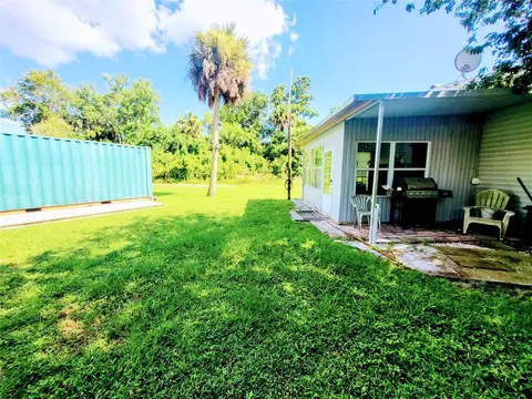 Exterior - 1048 Arvin Ln, Moore Haven, FL 33471 photo 3 of 8
