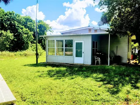 Exterior - 1048 Arvin Ln, Moore Haven, FL 33471 photo 2 of 8