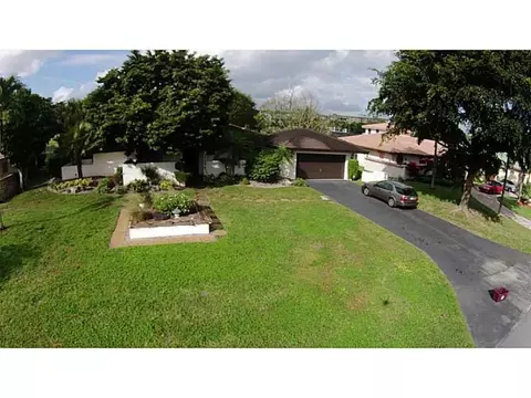 3155 Estates Dr, Pompano Beach, FL 33069 photo 1
