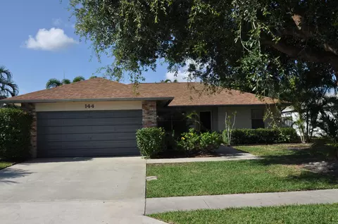 144 Arrowhead, Jupiter, FL 33458 photo 1