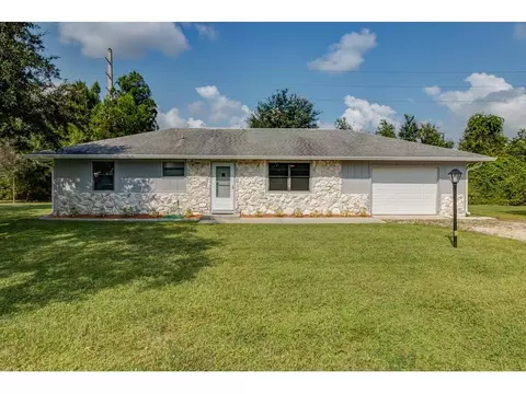 9830 Honeysuckle Dr, Micco, FL 32976 photo 1