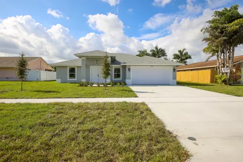 304 La Mancha Ave, Royal Palm Beach, FL 33411