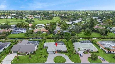 416 Muirfield Dr, Atlantis, FL 33462