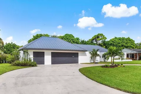 273 N Country Club Dr, Atlantis, FL 33462
