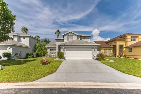 128 Heatherwood Dr, Royal Palm Beach, FL 33411