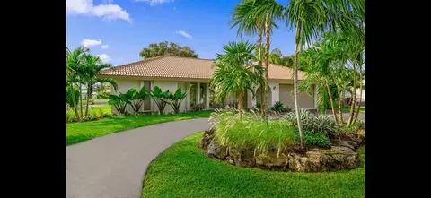 8301 Pine Tree Ln, Lake Clarke Shores, FL 33406