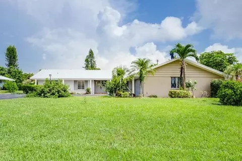 220 N Country Club Dr, Atlantis, FL 33462