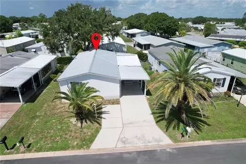 707 Hyacinth Cir, Barefoot Bay, FL 32976