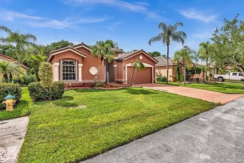6021 NW Swans Way, Coconut Creek, FL 33073