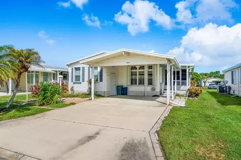 834 Lychee Dr, Barefoot Bay, FL 32976