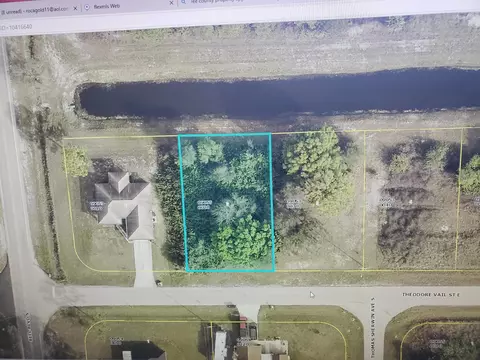 803 Theodore Vail E, Lehigh Acres, FL 33974
