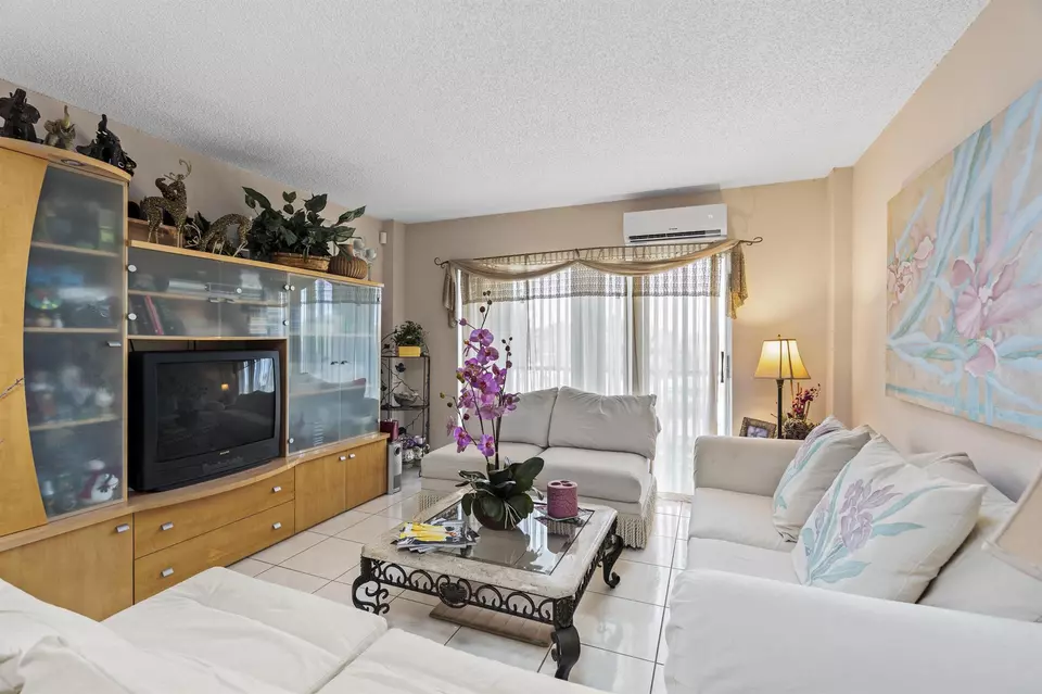 Living - 4174 Inverrary Dr #413, Lauderhill, FL 33319 photo 2 of 4