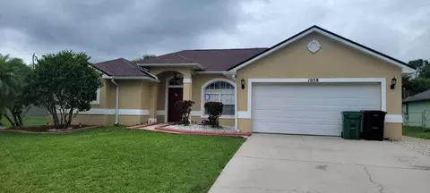 1058 SW Calmar Ave, Port Saint Lucie, FL 34953
