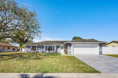 126 La Mancha Ave, Royal Palm Beach, FL 33411