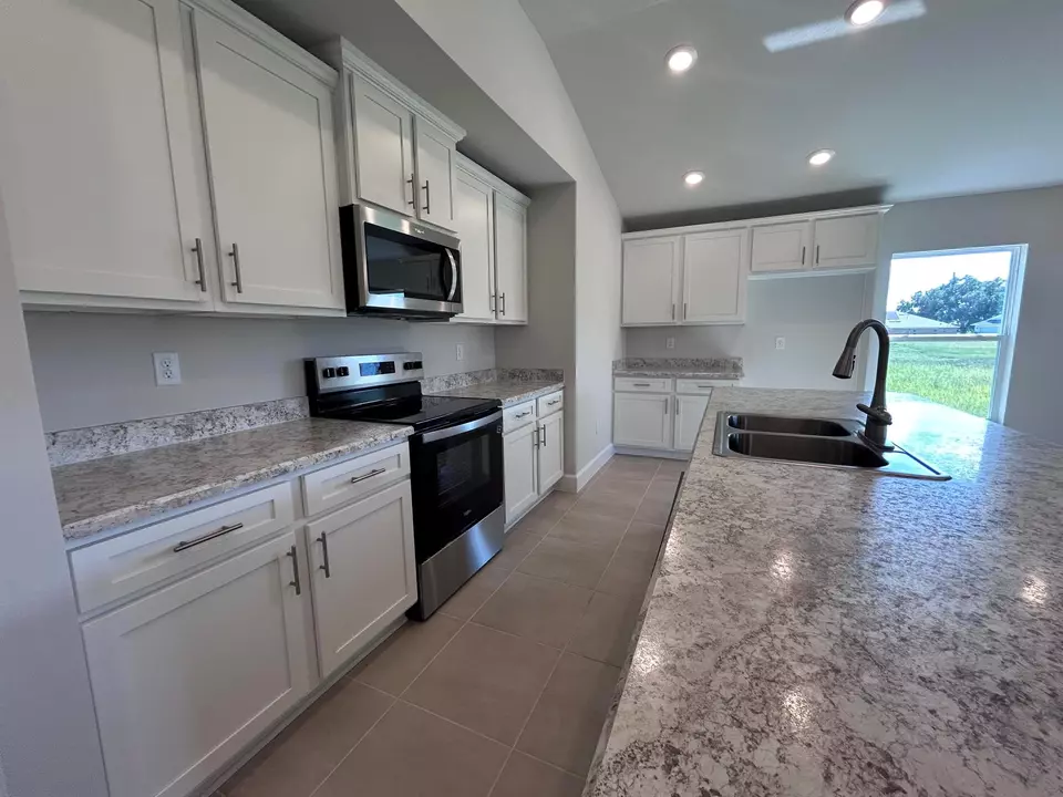 Kitchen - 8638 Giovanni Ave, Fort Pierce, FL 34951 photo 2 of 3
