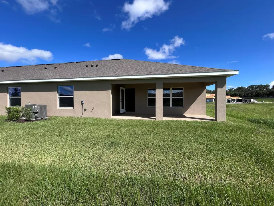 Exterior - 8638 Giovanni Ave, Fort Pierce, FL 34951 photo 3 of 7