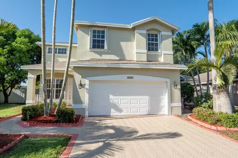 1722 Sawgrass Cir, Greenacres, FL 33413