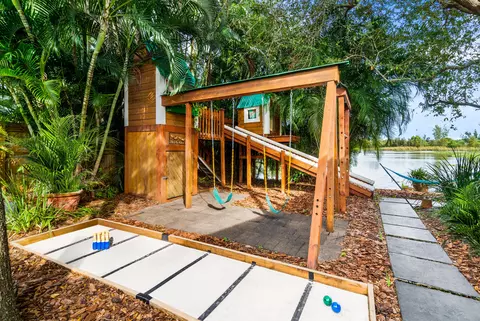 Exterior - 303 Lang Rd, Cloud Lake, FL 33406 photo 3 of 10