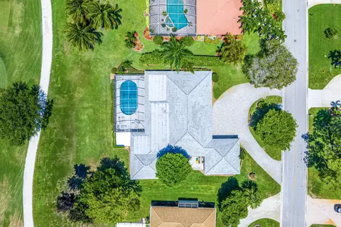 489 S Country Club Dr, Atlantis, FL 33462