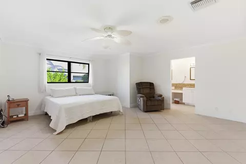 Bedroom - 5151 SE Burning Tree Cir, Stuart, FL 34997 photo 3 of 10
