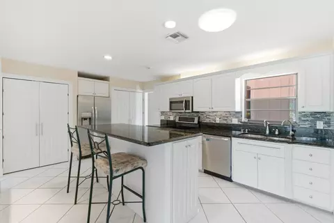 Kitchen - 5151 SE Burning Tree Cir, Stuart, FL 34997 photo 3 of 7